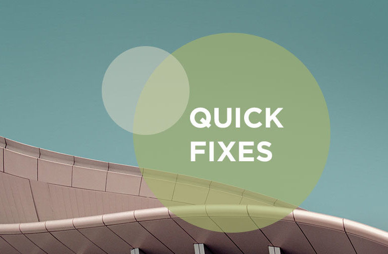 quick fixes text in green circle against landmark building